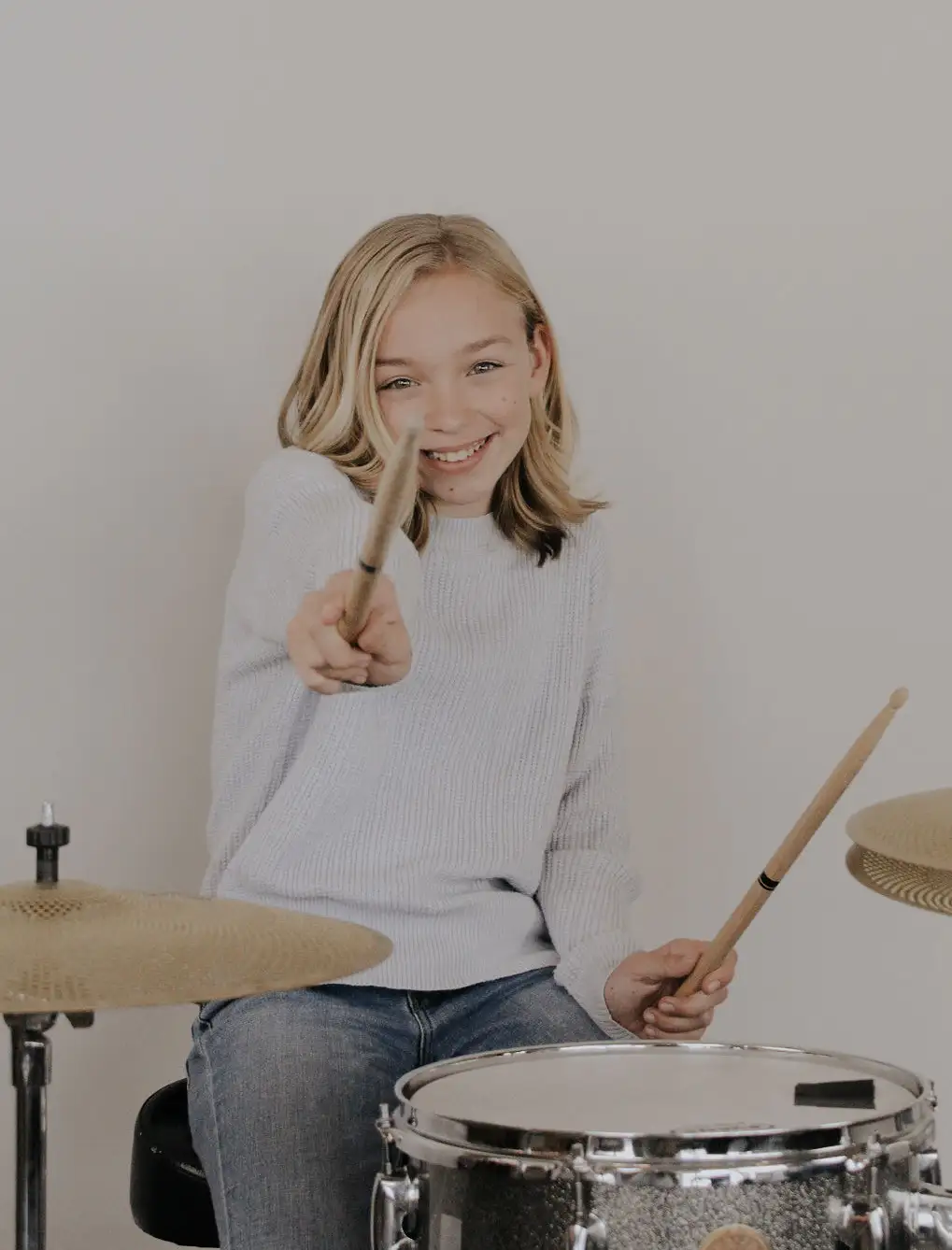 Girl playing drums